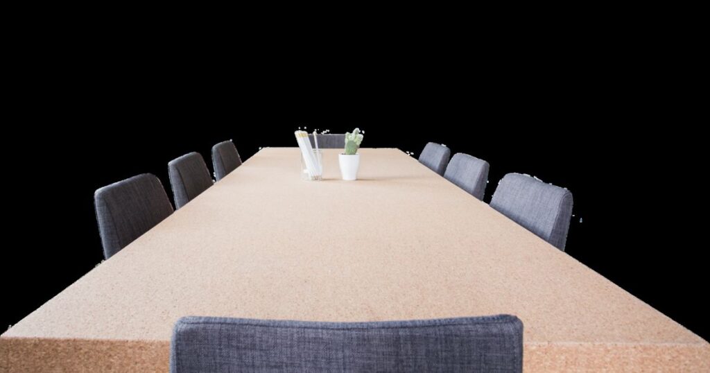 Empty conference table with chairs in a meeting room