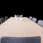 Empty conference table with chairs in a meeting room